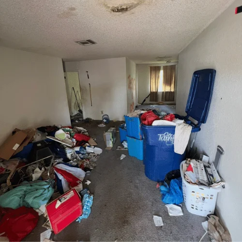 Hoarded living room in a Ruskin home before demolition